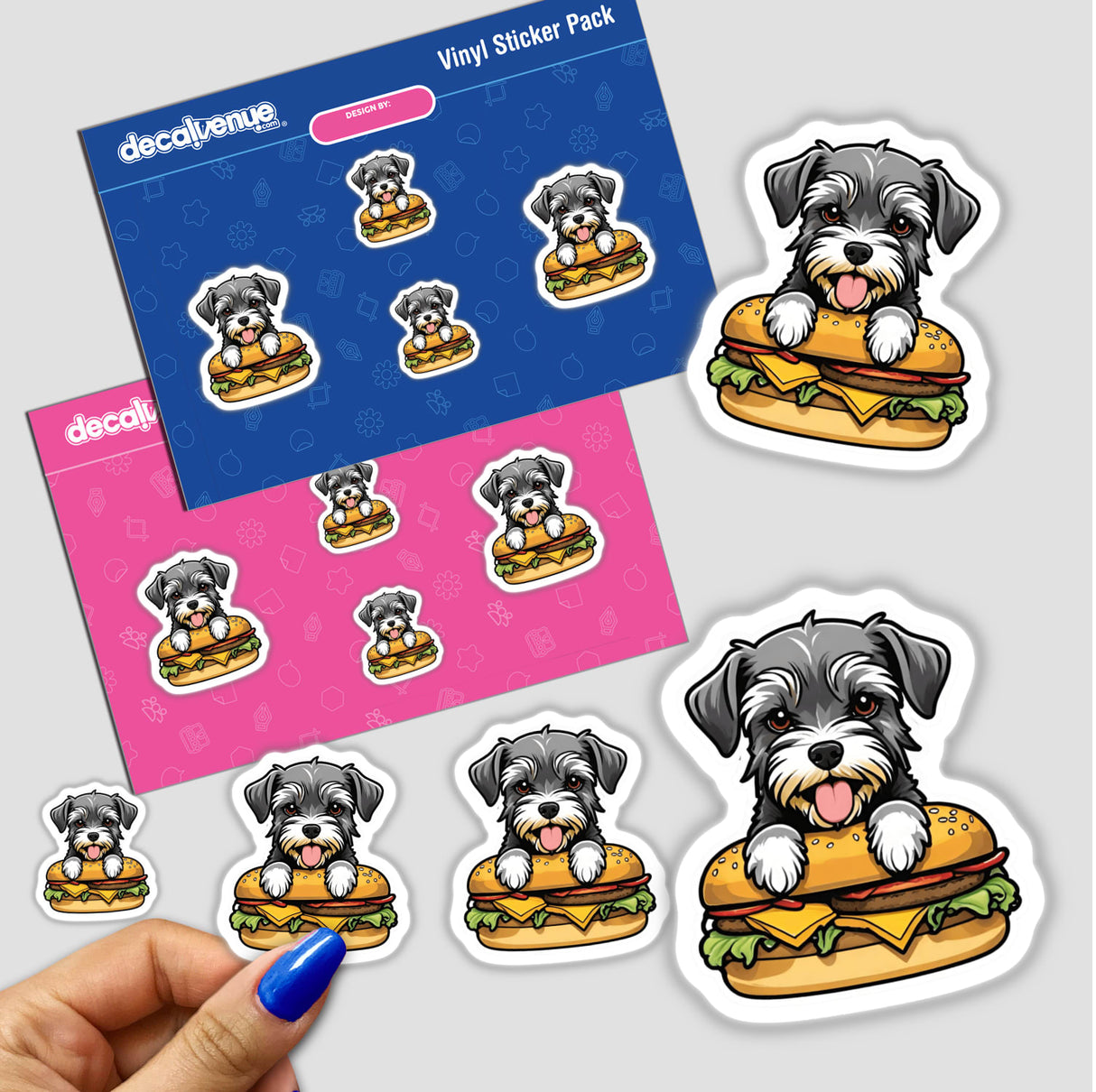 Illustrated stickers of a Schnauzer dog sitting on cheeseburgers, showcased in a product pack from the online shop Decal Venue.