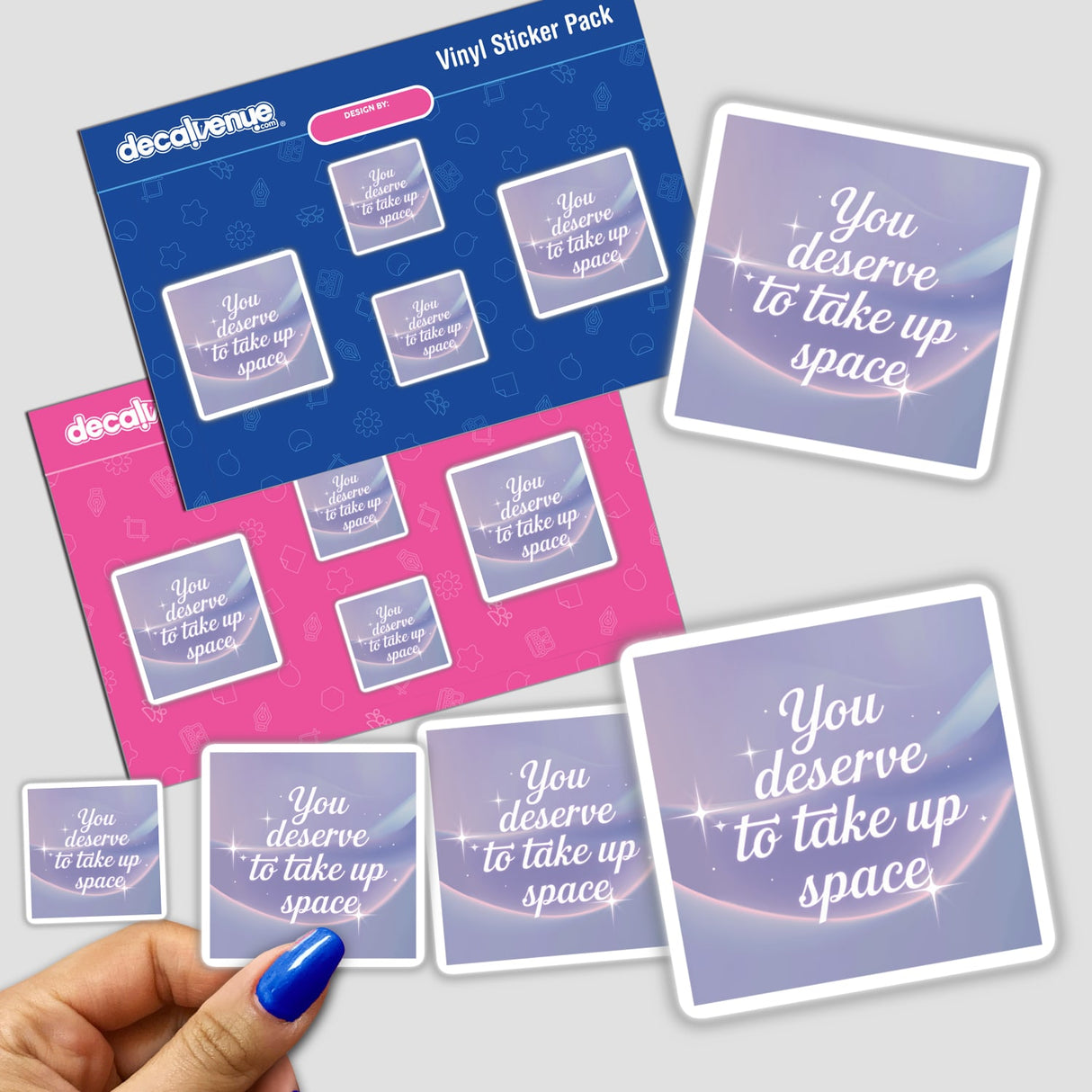 Hand holding You deserve to take up space sticker pack, showcasing unique vinyl stickers available as stationery or digital artwork from Decal Venue.