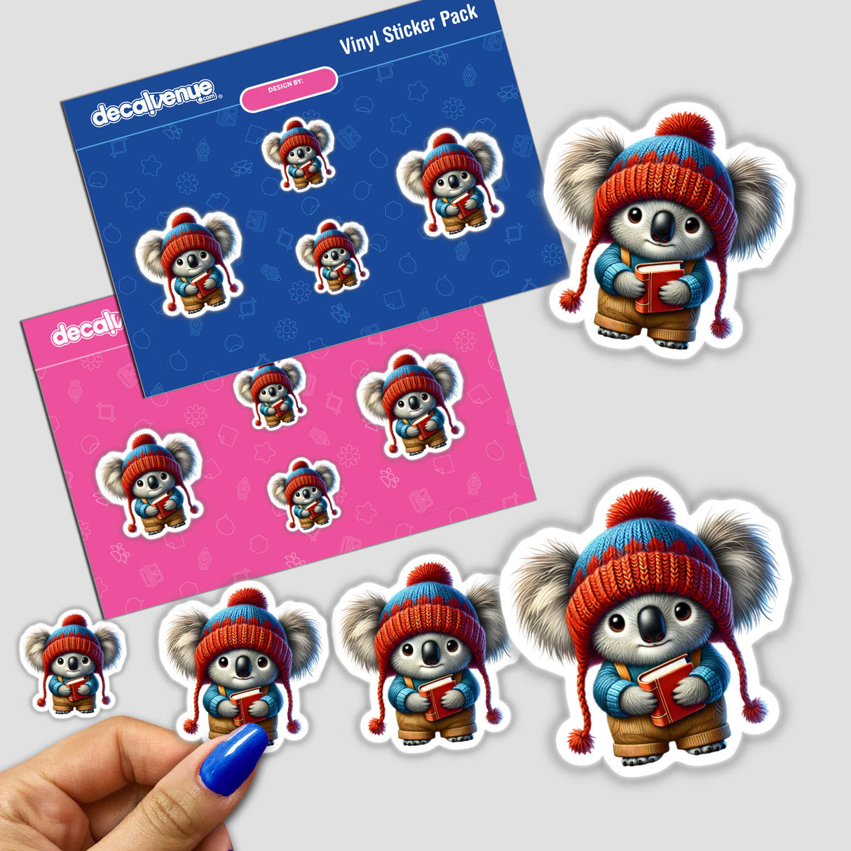 Koala Gnome Holding Book sticker featuring a cartoon koala wearing a knitted hat and holding a book.