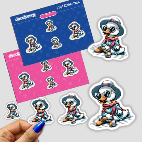 Fashionable Duck Sitting Pretty stickers feature a cartoon duck wearing a hat and sunglasses, showcased on a surface, with a close-up of a hand applying a sticker.