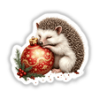 Hedgehog Sleeping on Christmas Ornament design, featuring a cozy hedgehog embracing a festive ornament, ideal for stickers or digital art from Decal Venue. Perfect for adding whimsy to holiday projects.