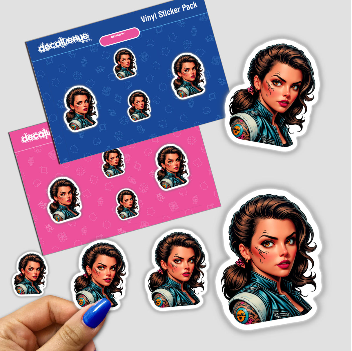 Sticker pack titled A Pretty Biker Girl With Tattoos, featuring cartoon illustrations of a woman with brown hair and facial tattoos, held in a hand. Available as stickers or digital artwork.