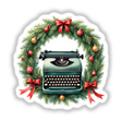 Typewriter in a Christmas Wreath design features a vintage typewriter adorned with festive elements, including a decorative wreath and bow, ideal as stickers or digital art from DecalVenue.