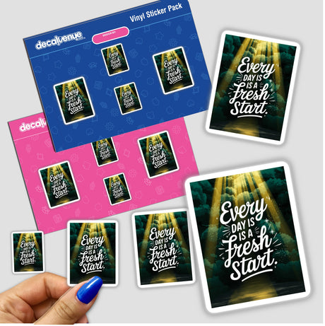 Hand holding a sticker pack titled Every day is a fresh start, showcasing a collection of unique vinyl stickers, available as stickers or digital artwork from Decal Venue.