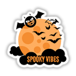 Spooky Vibes sticker features a moon with bats and playful text, ideal for Halloween decor. Available as a sticker or digital artwork from Decal Venue.