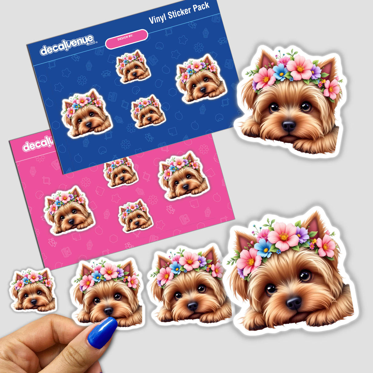 Cute Yorkshire Terrier Dog stickers featuring spring flowers, with a hand holding one. Perfect for decorating spaces, these stickers showcase adorable dog faces adorned with floral crowns.