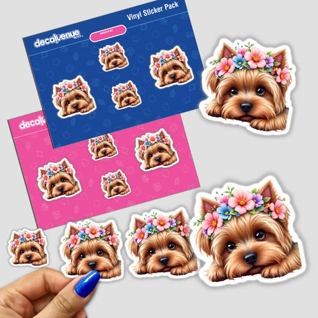 Cute Yorkshire Terrier Dog stickers featuring spring flowers, with a hand holding one. Perfect for decorating spaces, these stickers showcase adorable dog faces adorned with floral crowns.