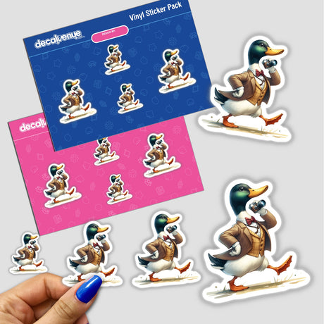 Colorful vinyl stickers featuring a mallard duck wearing camera equipment, surrounded by smaller stickers of the same duck in various poses, all part of the "Decal Venue" product line.