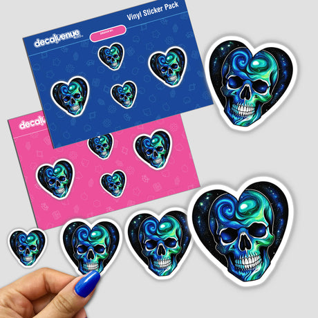 a hand holding a blue sticker next to a pack of stickers