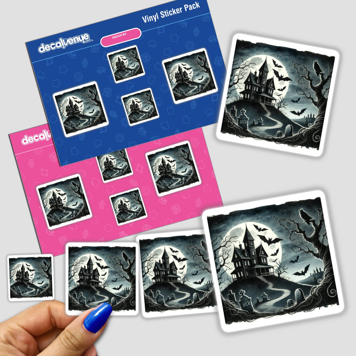 Hand holding Spooky Night - Haunted House and Bats Watercolor stickers featuring a castle and bats. Available as stickers or digital artwork from Decal Venue.