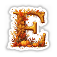 Fall Aesthetic Letter E Clipart | Stickers or Download with Commercial Rights: A decorative letter 'E' adorned with pumpkins and leaves, perfect for seasonal projects.