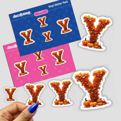 Thanksgiving Letter Y Clipart sticker featuring fall leaves and pumpkins, held by a hand. Available as stickers or for commercial use download.
