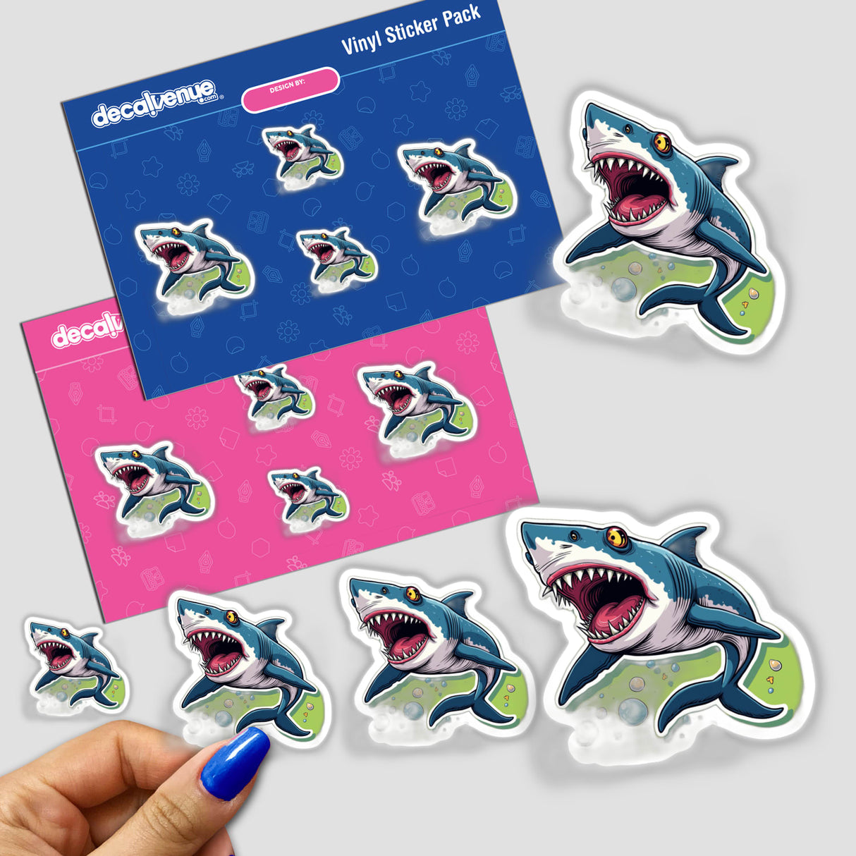 Mestre Tuba stickers featuring cartoon sharks with open mouths, held in hand, highlighting intricate designs. Available as stickers or digital artwork.