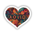 Colorful heart-shaped digital artwork with the word "LOVED" in the center, surrounded by intricate floral and swirling patterns in vibrant shades of red, orange, and turquoise. This digital art sticker is a unique and visually striking design.