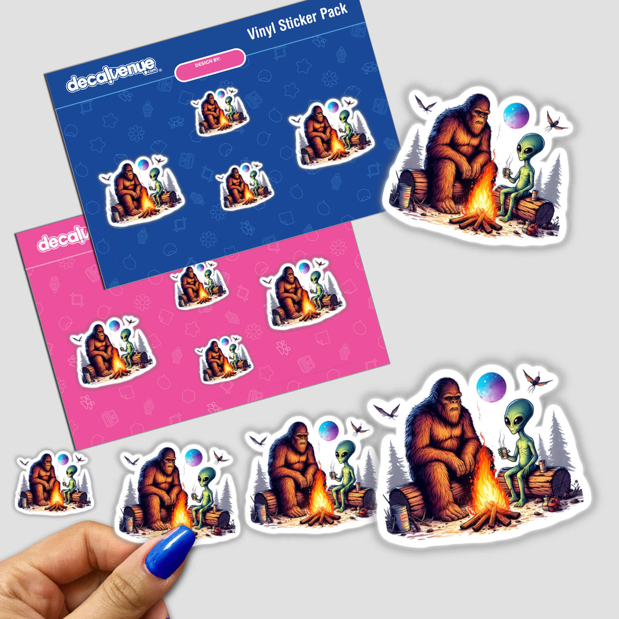 Sasquatch and Alien Around Camp Fire Camping sticker features a cartoon of Bigfoot and an alien sitting on logs, perfect for vinyl sticker collections or digital artwork enthusiasts.