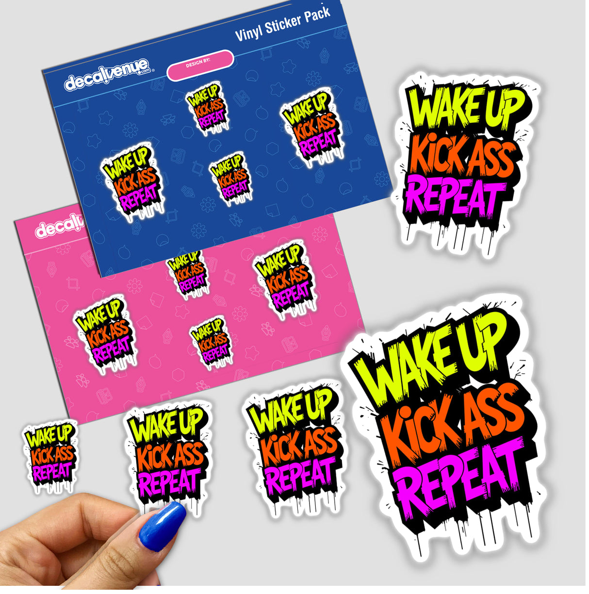 Hand holding Wake Up Kick Ass Repeat sticker pack, featuring motivational quote in vibrant design, ideal for personalizing spaces with humor and positivity. Perfect for laptops, journals, or gifting.