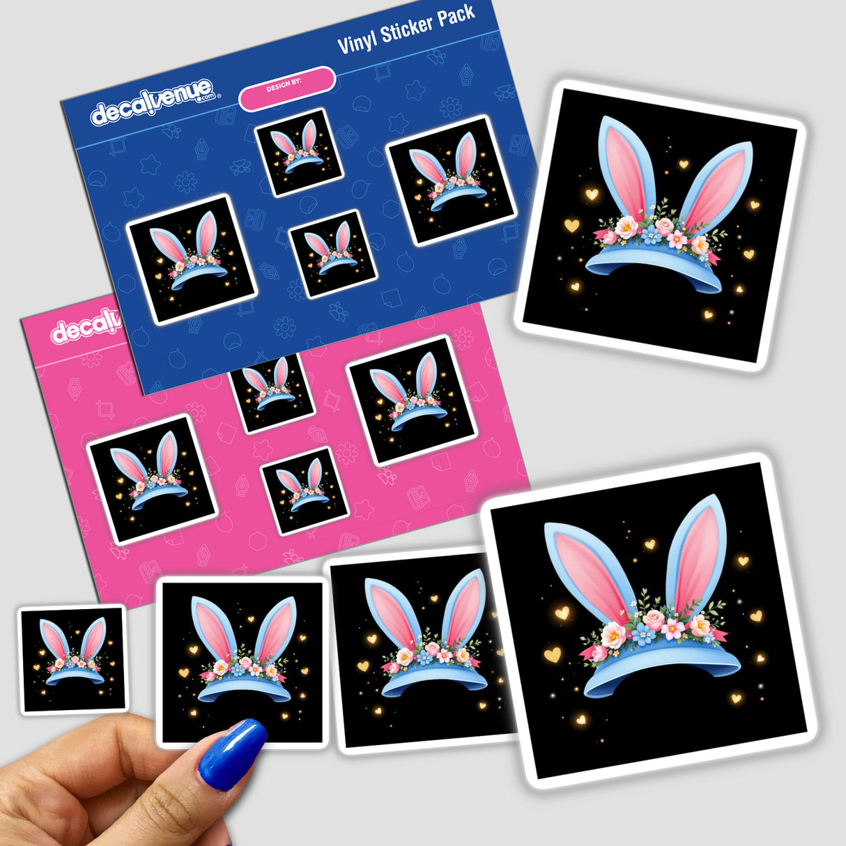 Blue Easter Bonnet with Gold Hearts sticker features pink bunny ears adorned with flowers, perfect for adding a playful touch to your collection. Available as stickers or digital artwork.