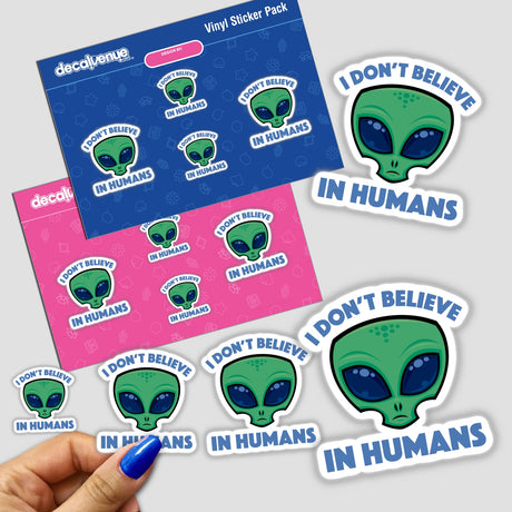 I Don’t Believe In Humans Cartoon Alien sticker featuring a green alien face with blue eyes, held by a hand with blue nail polish. Available as stickers or digital artwork.