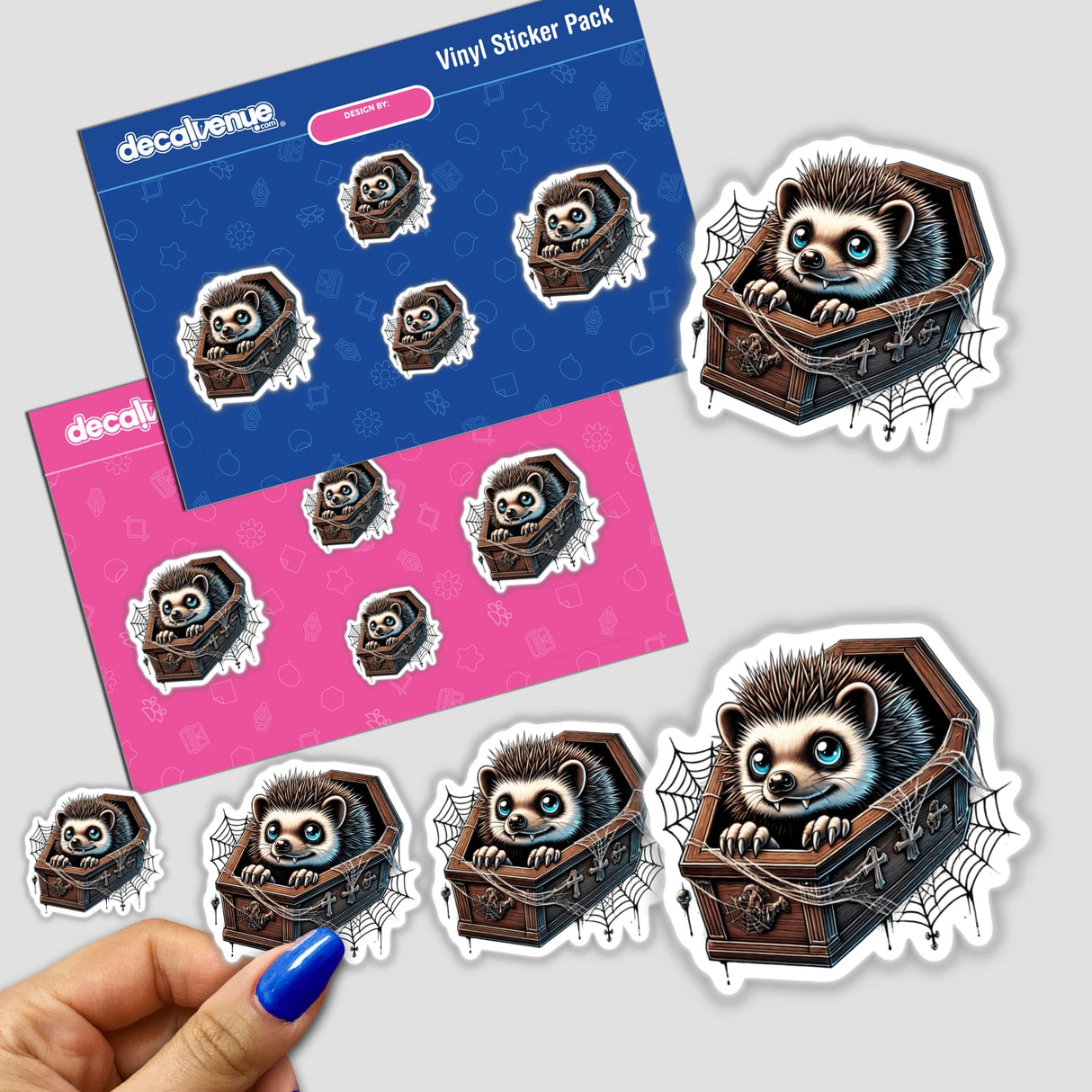 Cute Halloween hedgehog peeking out of decorative coffin in sticker pack, featuring whimsical digital artwork from DecalVenue's unique sticker collection.