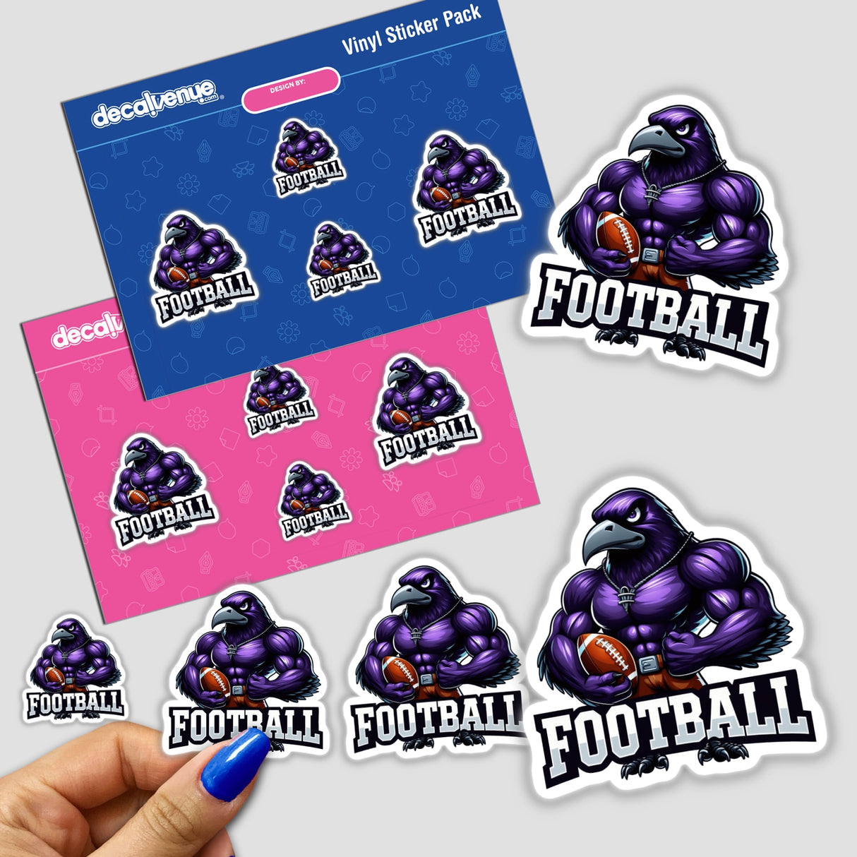 Muscular Raven Bird Holding Football II sticker, shown held by a hand, surrounded by other stickers and envelopes.