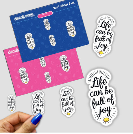 Hand holding 'Life Can Be Full Of Joy' motivational quote stickers, featuring bold black text on a white background, emphasizing positivity and inspiration, available as stickers or digital artwork.