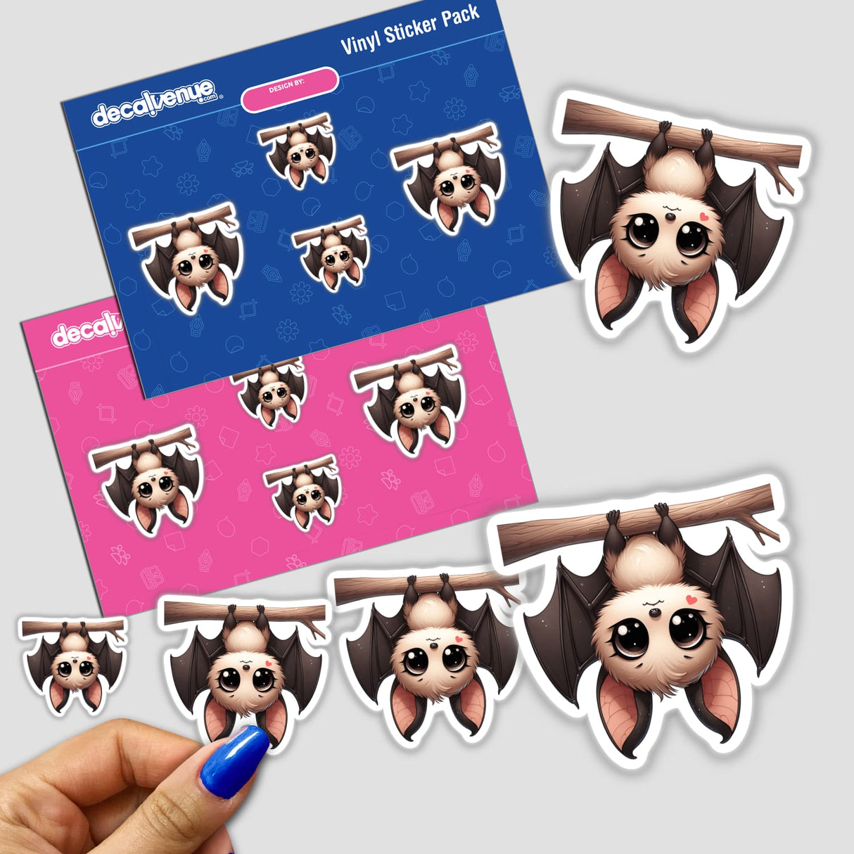Cute digital bat stickers displayed on a blue and pink vinyl sticker pack from Decal Venue, an online store specializing in unique stickers and digital art.