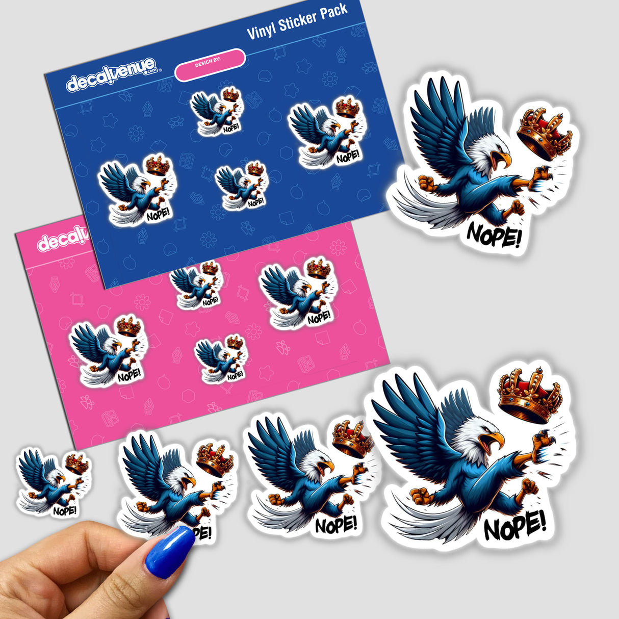 Nope No Kings American Bald Eagle sticker pack featuring vibrant cartoon graphics, showcasing a close-up of a finger holding one. Available as unique vinyl stickers or digital artwork.