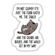 Cartoon cat lying on its back with Not Clumsy text, available as a sticker or digital artwork from Decal Venue.