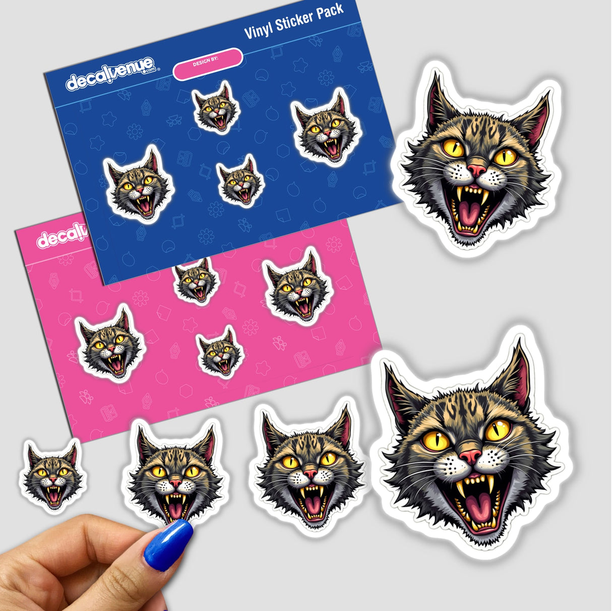 Gato Tigrado sticker pack showcasing various cat faces, including one with its mouth open, perfect for fans of unique feline-themed stickers and digital art.