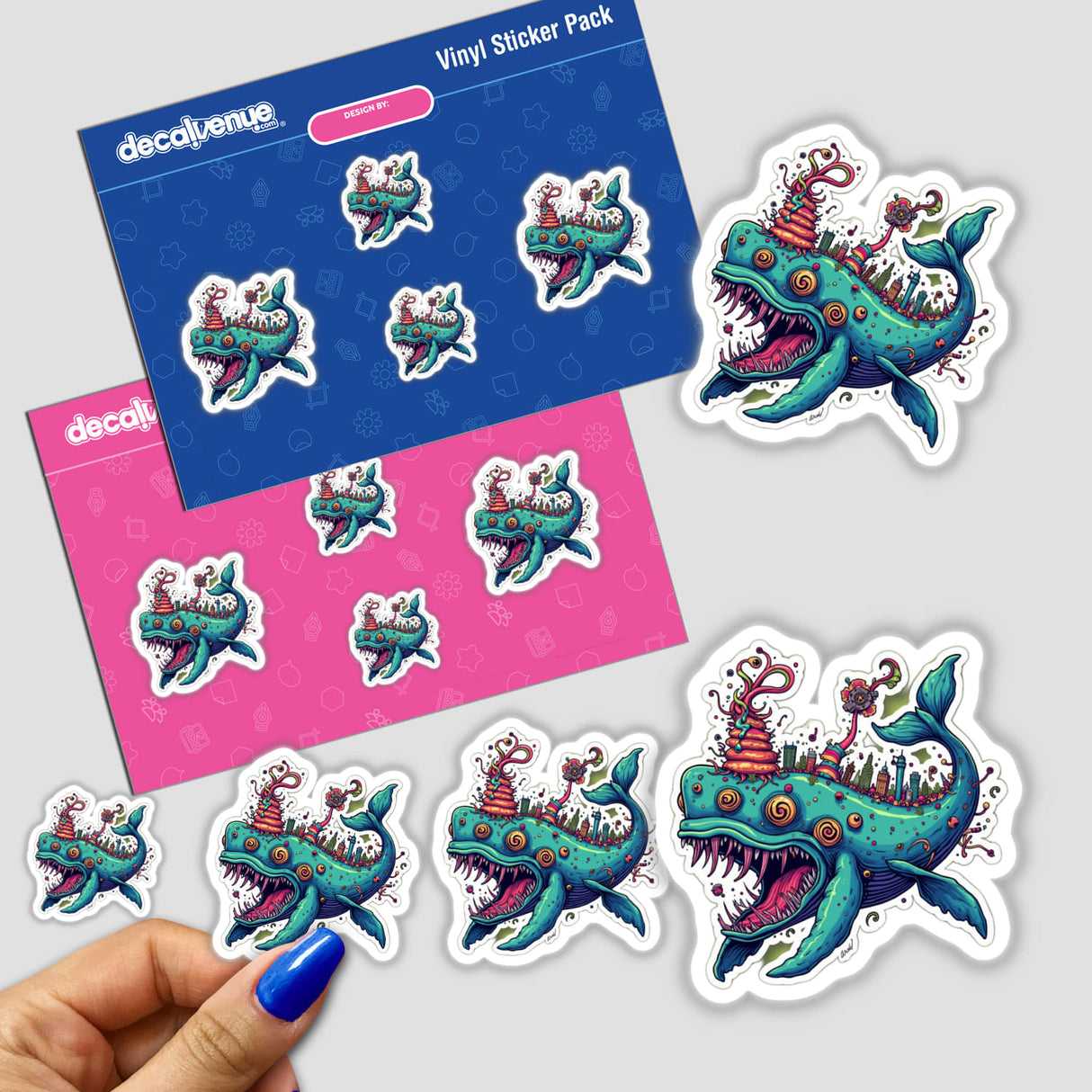 Baleia Fantasia stickers featuring whimsical cartoon whales and cityscapes, showcased alongside a person's fingers with blue nail polish. Available as stickers or digital artwork.