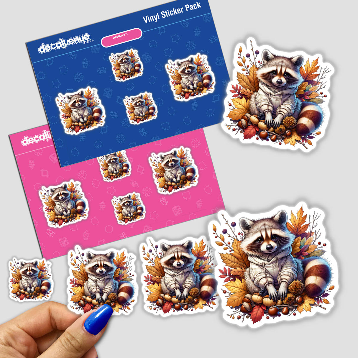 Autumn Raccoon in Cozy Sweatshirt: A sticker pack featuring cartoon raccoons in sweaters with leaves and acorns.