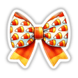 Candy Corn Pattern Coquette Bow available as stickers or digital artwork, featuring a candy corn design on a decorative bow.