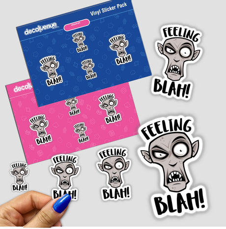 Feeling Blah Nosferatu Vampire stickers featuring cartoon faces and characters, available as unique vinyl stickers or digital artwork, shown in a close-up with a hand displaying a sticker.