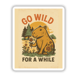 Go Wild for a While Sticker or Clipart featuring a cartoon capybara holding a flower, showcasing a nature-inspired, whimsical design available as stickers or digital artwork with commercial rights.
