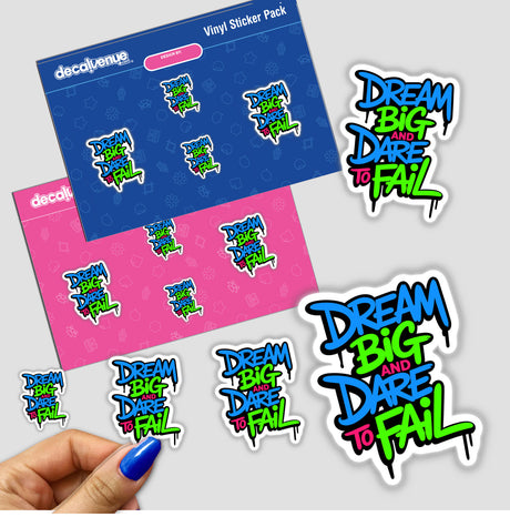 Hand holding a Dream Big And Dare To Fail motivational quote sticker, showcasing colorful and dynamic text design. Available as stickers or digital artwork from Decal Venue.