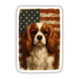 Cavalier King Charles Spaniel Patriotic Sticker featuring the breed with expressive eyes amid a distressed American flag, ideal for decorating personal items or creative projects.