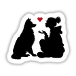 Silhouette of woman and Australian shepherd dog, red heart symbol above
