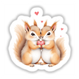 Snuggling Squirrels Holding Heart design features two cartoon squirrels embracing a heart, ideal for stickers or digital artwork, capturing love and nature's charm from Decal Venue.
