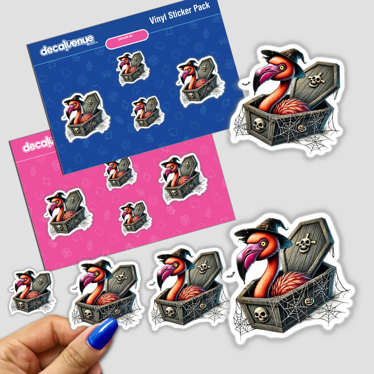 Halloween Flamingo Peeking Out of Coffin - Digital Artwork Stickers

The image shows a product package for a set of Halloween-themed digital artwork stickers from the Decal Venue brand. The stickers feature a flamingo peeking out of a coffin surrounded by spooky elements like cobwebs and skulls. The sticker set is displayed against a blue and pink background, showcasing the playful and unique designs.
