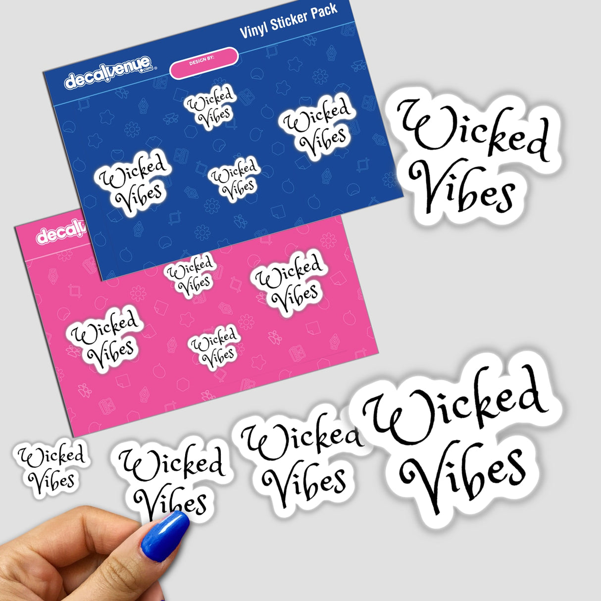 Wicked Vibes Statement Sticker held by a hand, showcasing bold typography. Available as both stickers and digital artwork, reflecting Decal Venue's unique collection of expressive designs.