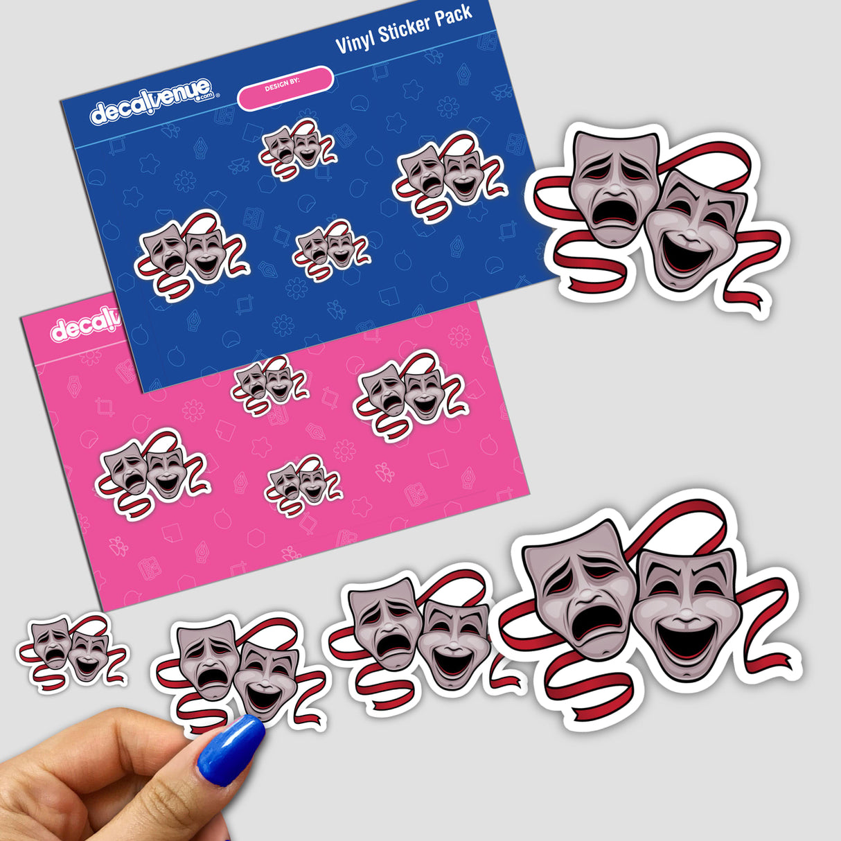 Comedy And Tragedy Theater Masks sticker pack featuring various stickers of theatrical masks with red and blue ribbons, shown with a hand holding one sticker, highlighting unique designs from Decal Venue.