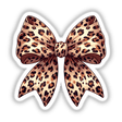 Leopard Print Coquette Bow featuring a stylish leopard pattern, available as stickers or digital artwork. Perfect for those looking to add a chic touch to their collection.