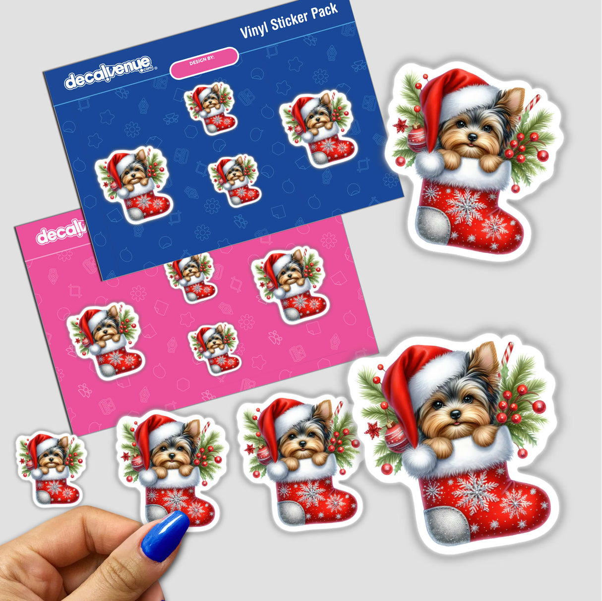 Sticker featuring a Yorkie Dog in Snowflake Christmas Stocking, held by a hand, capturing the festive charm of Decal Venue's unique sticker collection.