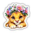 Majestic Lion Cub with a Blooming Flower Crown, depicted as a charming cartoon featuring a lion cub with a floral headpiece, ideal for stickers or digital artwork from Decal Venue.