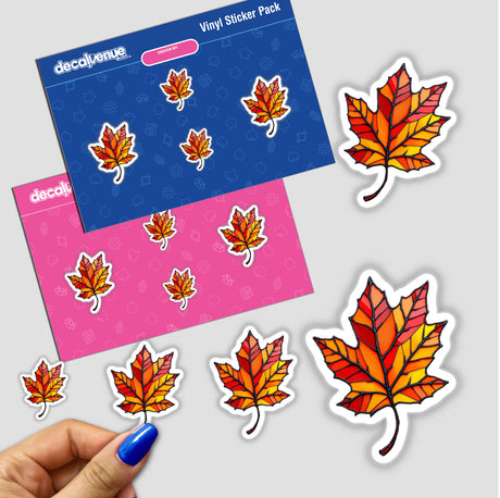 Autumn Leaf Stained Glass Style sticker pack showing colorful leaf designs, held in a hand, reflecting Decal Venue's unique sticker and digital art style. Available as stickers or digital artwork.