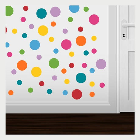 Vibrant polka dot wall decals in various sizes and colors surrounding a white door, creating a playful and decorative wall design.