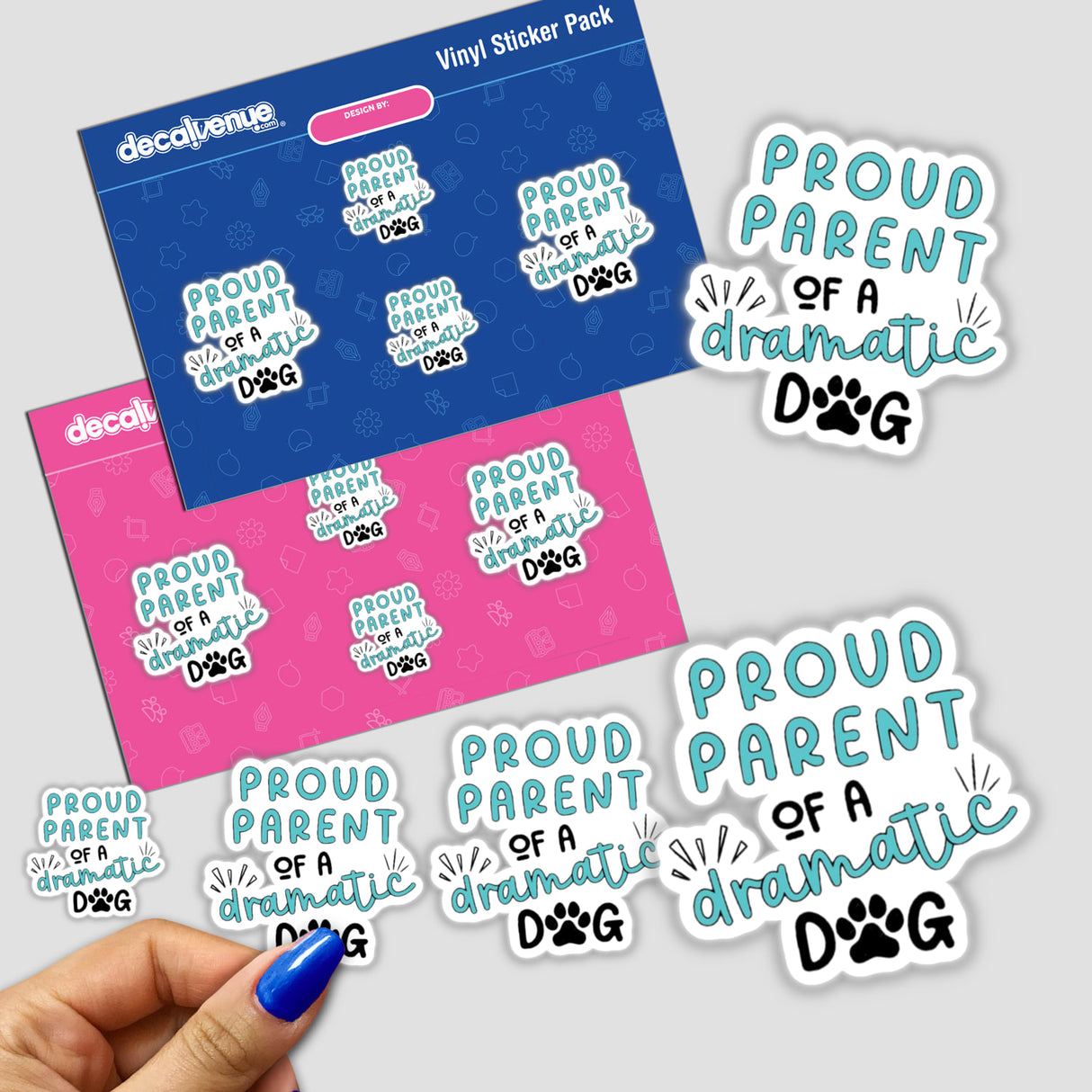 Hand holding Proud Parent Of A Dramatic Dog sticker, showcasing its playful design as part of Decal Venue's unique vinyl sticker collection.