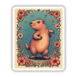 Capybara Floral Border Sticker or Clipart with Commercial Rights features a whimsical cartoon capybara framed by vibrant flowers, ideal for unique vinyl sticker or digital art enthusiasts.