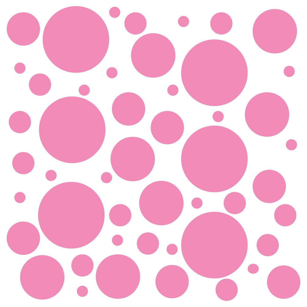 Assorted pink polka dot circles of varying sizes arranged on a plain background