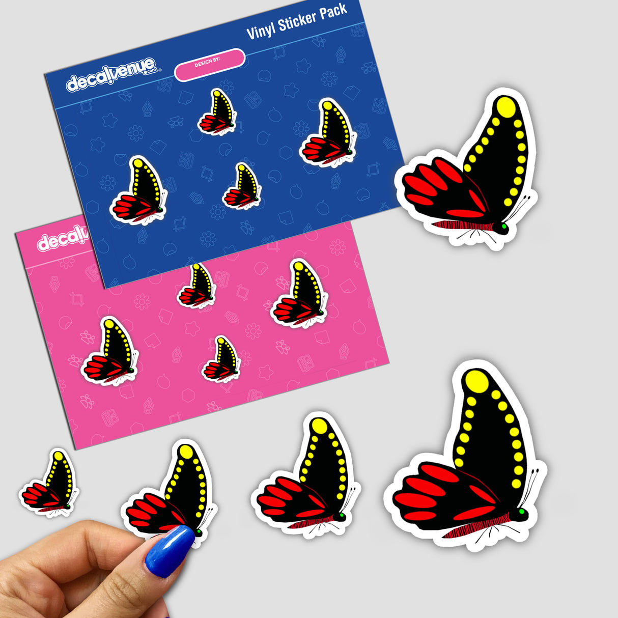 BLACK BUTTERFLY WITH YELLOW SPOTS AND RED SPOTS